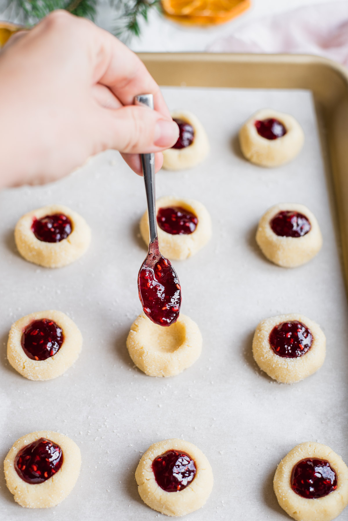 Raspberry Almond Holiday Thumbprint Cookies - GastroSenses
